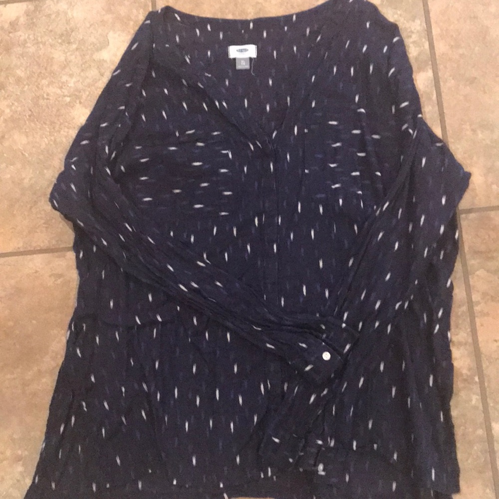 Long sleeve light weight beachy  linen I believe